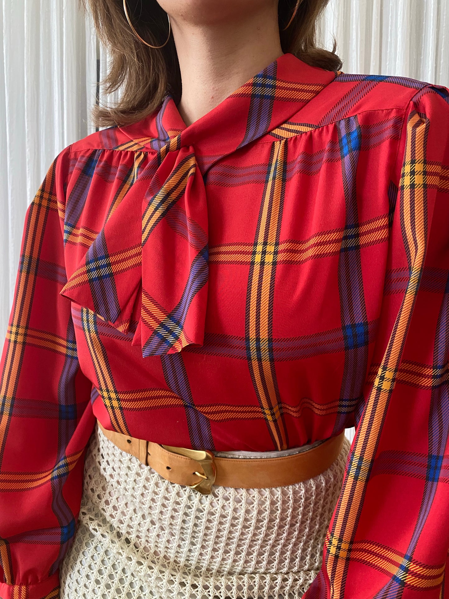 Plaid long sleeve top with small pussy bow tie neck