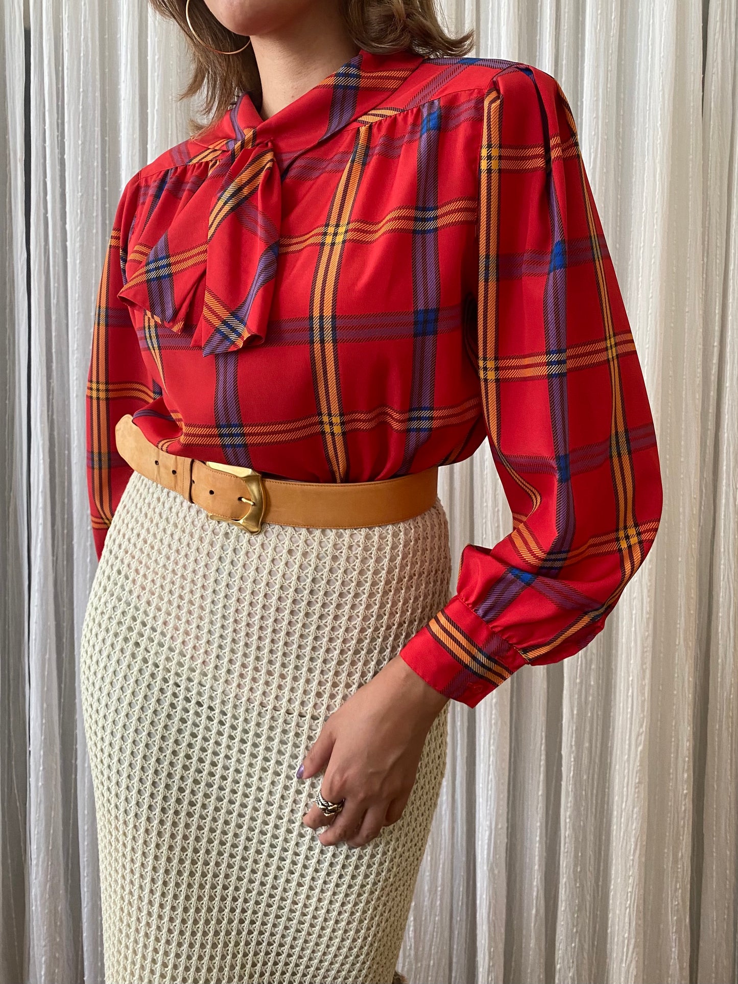 Plaid long sleeve top with small pussy bow tie neck
